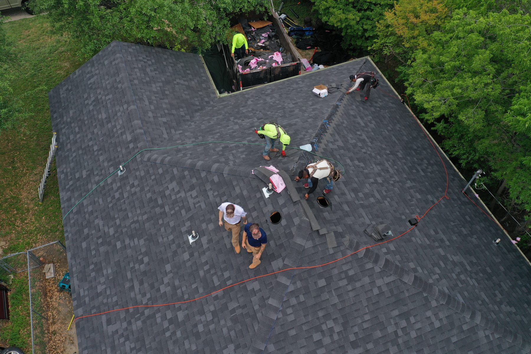 Acorn crew on a roof, shot from the air